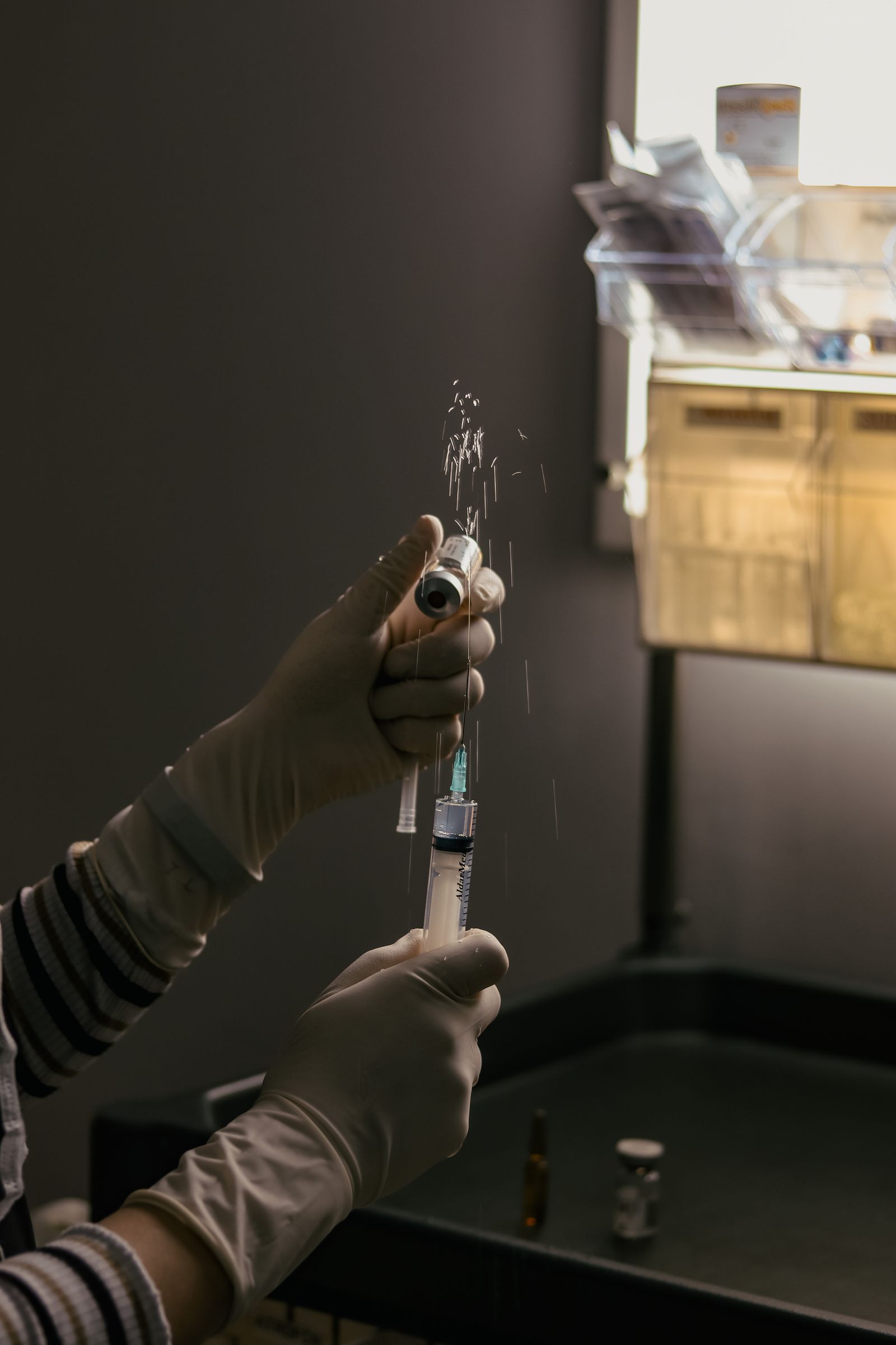Lab technician processing clinical trial samples